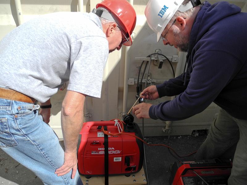 2012 PVARC Field Day Storey KA6WNK-3.jpg - Jeff Wolf K6JW and Joe Pace NZ6L checking Honda inverter